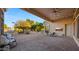Covered patio with string lights, outdoor furniture, and a built-in grill at 6429 S Honor Ct, Gilbert, AZ 85298