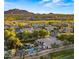 Luxury home with a pool, basketball court, and expansive backyard at 6429 S Honor Ct, Gilbert, AZ 85298