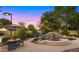 Peaceful backyard with a pool, spa, and patio furniture at 6429 S Honor Ct, Gilbert, AZ 85298
