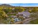 Luxury home with a pool, basketball court, and expansive backyard at 6429 S Honor Ct, Gilbert, AZ 85298