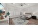Spacious main bedroom with white plantation shutters and hardwood floors at 6429 S Honor Ct, Gilbert, AZ 85298
