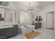 Spa-like bathroom featuring a freestanding tub and marble flooring at 6429 S Honor Ct, Gilbert, AZ 85298