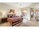 Bright bedroom with a queen bed, large window, and fireplace at 16349 E Links Dr, Fountain Hills, AZ 85268