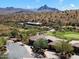 Aerial view of homes with mountain and golf course views at 16349 E Links Dr, Fountain Hills, AZ 85268