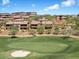Aerial view of community with multiple residential homes near a golf course at 16349 E Links Dr, Fountain Hills, AZ 85268