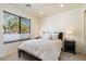 Bedroom with a double bed, large window, and neutral decor at 16349 E Links Dr, Fountain Hills, AZ 85268