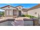 Single-story home with a courtyard entry at 19926 N Organ Pipe Dr, Surprise, AZ 85374