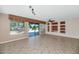 Living room with tile floors and sliding glass doors to backyard at 19926 N Organ Pipe Dr, Surprise, AZ 85374