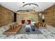 Modern lobby with leather sofas, accent chairs, and wood walls at 7180 E Kierland Blvd # 314, Scottsdale, AZ 85254