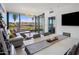 Spacious living room with a comfortable sectional sofa and city views at 7180 E Kierland Blvd # 314, Scottsdale, AZ 85254
