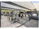 Community patio with large table, grill, and bar seating at 7180 E Kierland Blvd # 314, Scottsdale, AZ 85254
