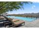 Resort-style pool with lounge chairs and mountain views at 7180 E Kierland Blvd # 314, Scottsdale, AZ 85254