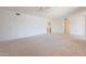 Bright and airy carpeted bedroom with neutral walls at 9510 W Calico Dr, Sun City, AZ 85373