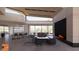 Modern living room with fireplace and wet bar at 6612 E Hummingbird Ln, Paradise Valley, AZ 85253