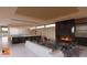 Elegant living room with fireplace, comfortable seating, and open floor plan at 6612 E Hummingbird Ln, Paradise Valley, AZ 85253