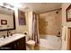 Updated bathroom with granite vanity, shower/tub combo, and modern fixtures at 8307 E Vista De Valle --, Scottsdale, AZ 85255