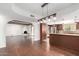 Kitchen with granite countertops, dark wood cabinets, and stainless steel appliances at 8307 E Vista De Valle --, Scottsdale, AZ 85255