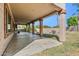 Covered patio with concrete flooring and backyard access at 19435 N 62Nd Ave, Glendale, AZ 85308
