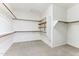 Large walk-in closet with ample shelving and hanging space at 19435 N 62Nd Ave, Glendale, AZ 85308