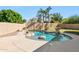 Relaxing kidney-shaped pool with rock landscaping at 19435 N 62Nd Ave, Glendale, AZ 85308