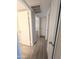 Clean hallway with light gray walls and hardwood floors at 2044 W 9Th Ave, Apache Junction, AZ 85120