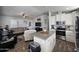 Modern kitchen with island and stainless steel appliances at 650 N Hawes Rd # 3314, Mesa, AZ 85207