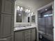 Double vanity bathroom with a large mirror and shower at 650 N Hawes Rd # 3314, Mesa, AZ 85207