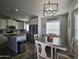 Modern kitchen with stainless steel appliances and an island at 650 N Hawes Rd # 3314, Mesa, AZ 85207