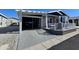 Attached garage with carport, providing ample parking and storage at 650 N Hawes Rd # 3314, Mesa, AZ 85207