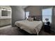 Main bedroom with king-size bed and en-suite bathroom at 650 N Hawes Rd # 3314, Mesa, AZ 85207