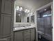 Clean bathroom with double sinks and a walk-in shower at 650 N Hawes Rd # 3314, Mesa, AZ 85207
