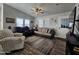Comfortable living room with seating and wood-look floors at 650 N Hawes Rd # 3314, Mesa, AZ 85207