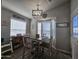 Cozy dining area with a table and chairs near a window at 650 N Hawes Rd # 3314, Mesa, AZ 85207