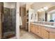 Bathroom with double vanity, large shower, and tile flooring at 14428 E Monument Dr, Scottsdale, AZ 85262