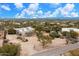 Aerial view showing a house, yard, and mountain views at 14428 E Monument Dr, Scottsdale, AZ 85262