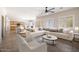 Open living area with sectional sofa and kitchen views at 14428 E Monument Dr, Scottsdale, AZ 85262