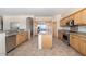 Kitchen with stainless steel appliances and an island at 14428 E Monument Dr, Scottsdale, AZ 85262