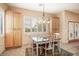 Kitchen features breakfast nook, ample cabinet space, and large windows at 14428 E Monument Dr, Scottsdale, AZ 85262