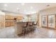 Open kitchen with island and breakfast bar seating at 14428 E Monument Dr, Scottsdale, AZ 85262