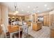 Bright kitchen with breakfast nook, island, and stainless steel appliances at 14428 E Monument Dr, Scottsdale, AZ 85262