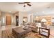 Spacious living room with hardwood floors and access to kitchen at 14428 E Monument Dr, Scottsdale, AZ 85262