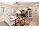Bright living room with built-in shelving and a cozy seating area at 14428 E Monument Dr, Scottsdale, AZ 85262