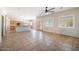 Spacious kitchen with island, wood cabinets, and granite countertops at 14428 E Monument Dr, Scottsdale, AZ 85262