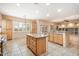 Large kitchen with an island and lots of cabinet space at 14428 E Monument Dr, Scottsdale, AZ 85262