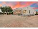 Stunning stucco home with a large screened porch and a spacious backyard at 14428 E Monument Dr, Scottsdale, AZ 85262