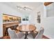 Charming kitchen nook with a round table and four chairs, perfect for casual dining at 9252 E Whitethorn Cir, Scottsdale, AZ 85266