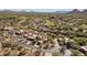 Aerial view of property and neighborhood, highlighting the desert setting at 9252 E Whitethorn Cir, Scottsdale, AZ 85266