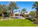 Stunning backyard oasis with pool and expansive lawn at 6515 E Stallion Rd, Paradise Valley, AZ 85253