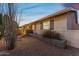 Single-story home with updated siding and modern window shutters at 8420 E Hubbell St, Scottsdale, AZ 85257