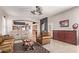 Spacious living room with leather furniture and a view into the kitchen at 22814 N 32Nd Ave, Phoenix, AZ 85027